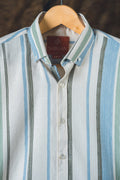 Striped shirt on a hanger with 'Najraan' label visible